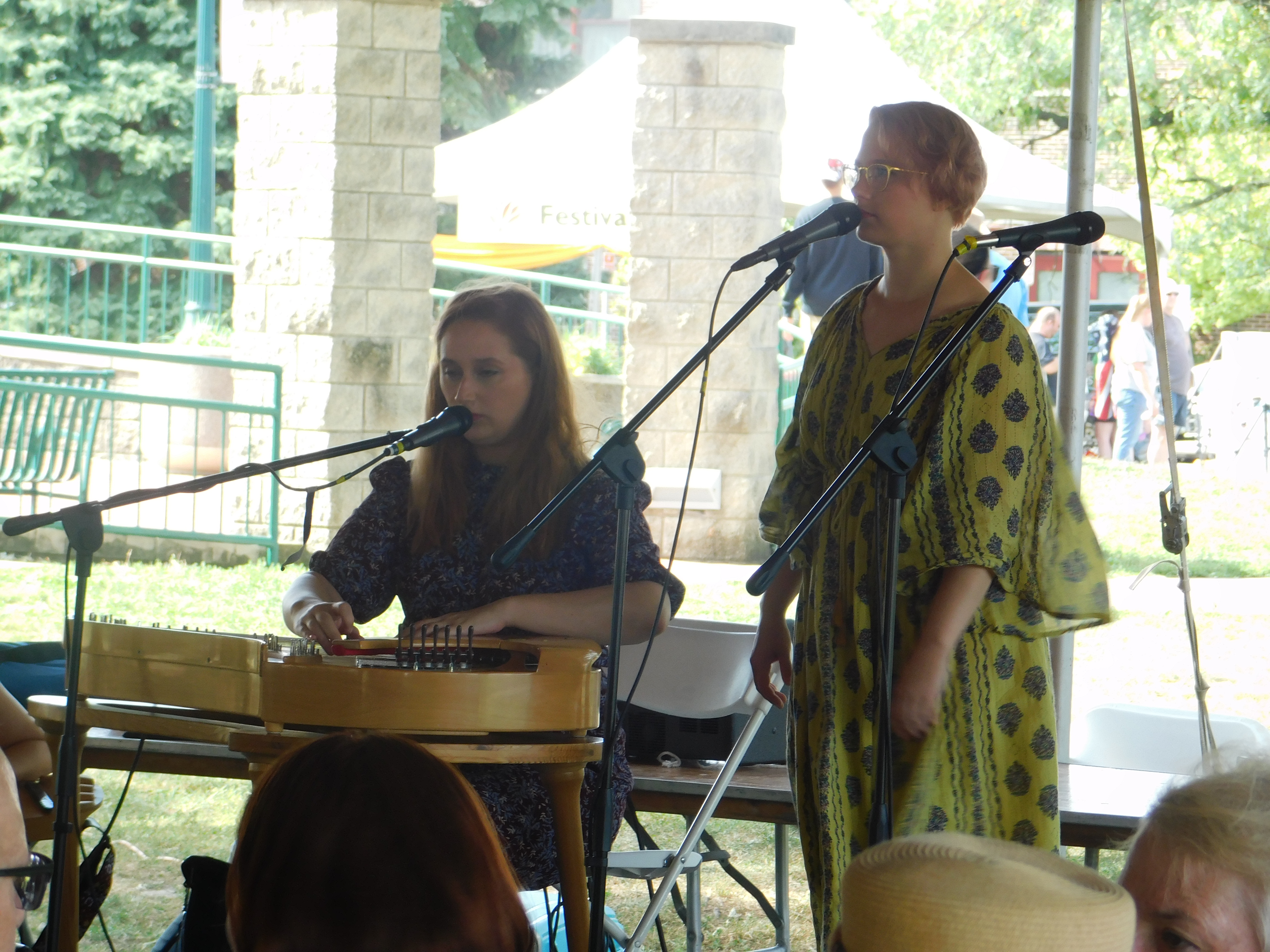 Two people performing instruments