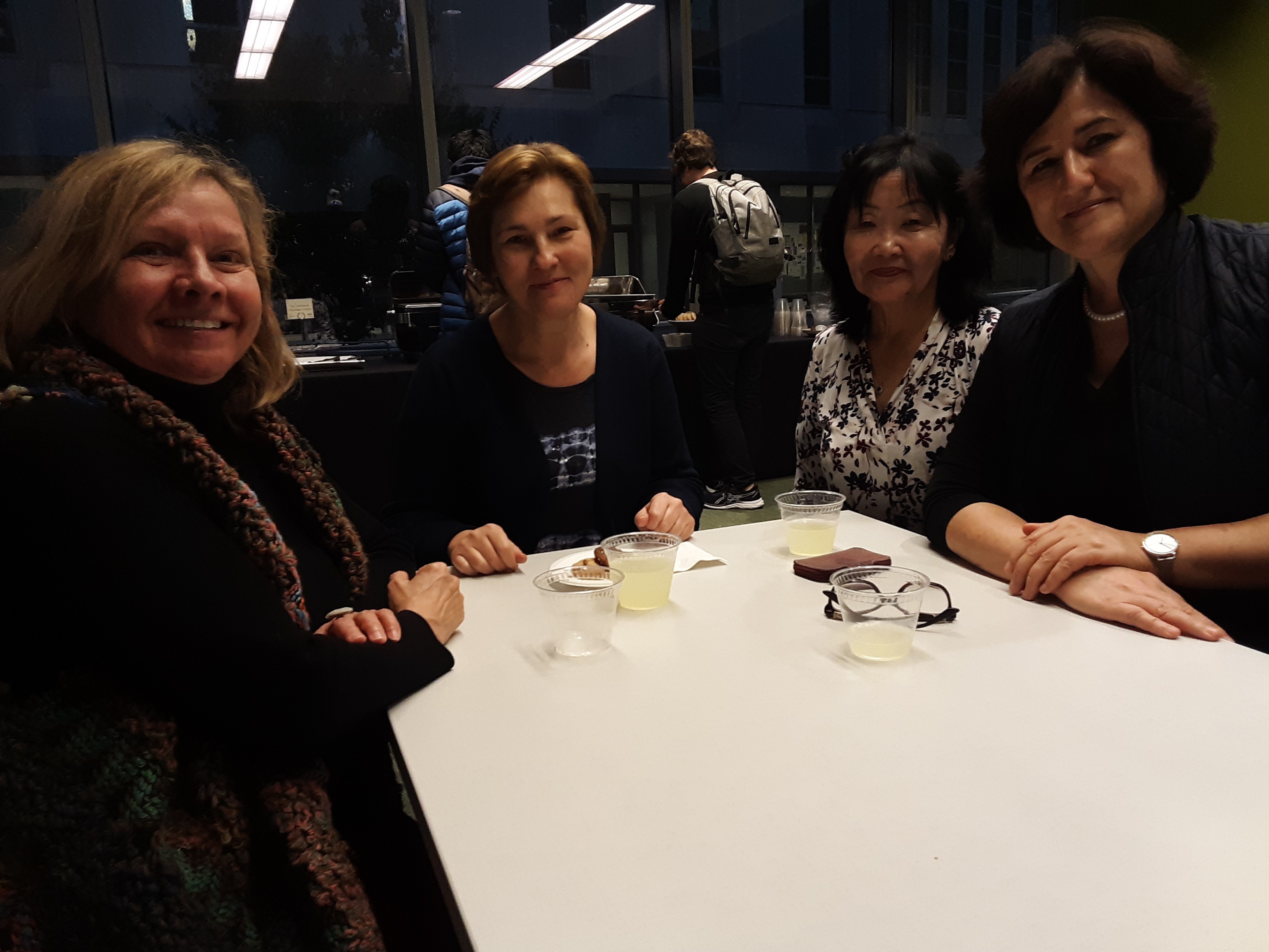 Four women smiling at camera