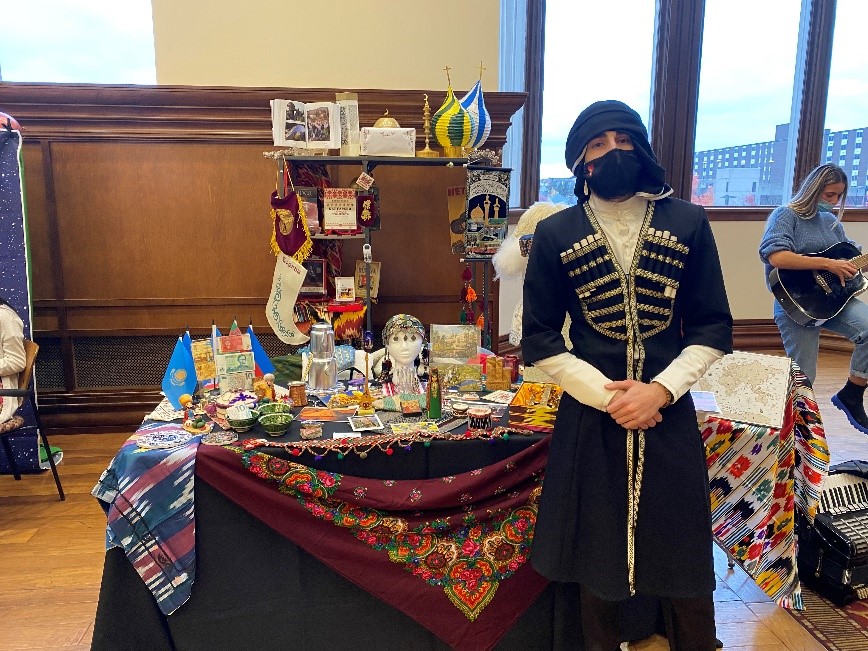 Man standing in front of stand at Beeka Worldsfare